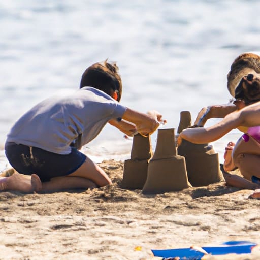 ילדים בונים ארמונות חול בחוף ברצלונטה